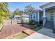The backyard features a wooden deck adjacent to the home at 6911 N 19Th St, Tampa, FL 33610