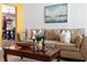 Cozy living room featuring a comfortable sofa, stylish decor, and natural light at 7320 Burlington N Ave, St Petersburg, FL 33710