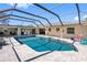 Stunning pool with covered patio, offering a perfect blend of relaxation and outdoor living at 7320 Burlington N Ave, St Petersburg, FL 33710