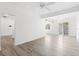 Bright and airy living room with modern vinyl flooring, plenty of natural light, and an open layout at 930 40Th Ne Ave, St Petersburg, FL 33703