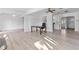 Spacious living room showcasing new flooring, natural light, and an open layout at 930 40Th Ne Ave, St Petersburg, FL 33703