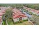 Aerial shot of condo community, showcasing the architecture and surrounding greenery at 9481 Highland Oak Dr # 706, Tampa, FL 33647