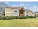 Charming condo building with lush landscaping and a well-kept green lawn at 9481 Highland Oak Dr # 706, Tampa, FL 33647