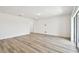 Spacious living room with plenty of natural light and modern flooring at 10537 Hidden Banks Gln, Parrish, FL 34219