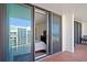 Balcony view with sliding glass doors leading to bedroom, overlooking beachfront condo views at 1430 Gulf Blvd # 603, Clearwater Beach, FL 33767