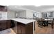Modern kitchen with stainless steel appliances and breakfast bar seating is perfect for entertaining at 1430 Gulf Blvd # 603, Clearwater Beach, FL 33767