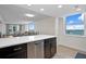 Open-concept kitchen with white countertops offers a bright and airy atmosphere at 1430 Gulf Blvd # 603, Clearwater Beach, FL 33767