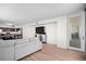 Bright and open living space with wood floors flowing into dining and views of the outside balcony at 1430 Gulf Blvd # 603, Clearwater Beach, FL 33767