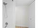 White subway tile shower with adjustable shower head in bathroom at 1430 Gulf Blvd # 603, Clearwater Beach, FL 33767