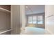 Unfurnished bedroom showcasing ample closet space and a bright window at 146 4Th Ne Ave # 204, St Petersburg, FL 33701