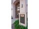 Building entrance with historic marker and well-maintained landscaping at 146 4Th Ne Ave # 204, St Petersburg, FL 33701