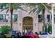 Beautiful building entrance with palm trees and well-maintained landscaping at 146 4Th Ne Ave # 204, St Petersburg, FL 33701