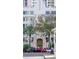 Luxury apartment complex featuring palm trees and a portico entrance at 146 4Th Ne Ave # 204, St Petersburg, FL 33701