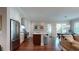 Bright kitchen with stainless steel appliances, island, and a dining area with access to an outdoor balcony at 146 4Th Ne Ave # 204, St Petersburg, FL 33701
