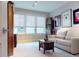 Comfortable living area with modern furniture, built-in cabinets, and large window at 146 4Th Ne Ave # 204, St Petersburg, FL 33701
