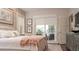 Relaxing main bedroom with balcony views, chic furnishings, and serene atmosphere for a restful sleep at 146 4Th Ne Ave # 204, St Petersburg, FL 33701