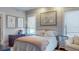 Cozy main bedroom featuring a comfortable bed, soft lighting, and elegant decor for a peaceful atmosphere at 146 4Th Ne Ave # 204, St Petersburg, FL 33701