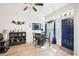 Elegant dining area featuring a modern chandelier and stylish decor at 1704 Lullwater Ln, Lutz, FL 33549