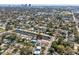 Bird's eye perspective of a home near a canal, with the cityscape in the distance at 1753 25Th N Ave, St Petersburg, FL 33713