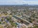 Scenic view of home near a body of water with the city skyline in the distance at 1753 25Th N Ave, St Petersburg, FL 33713