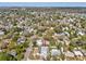 High angle view of the home within a lush, green residential community setting at 1753 25Th N Ave, St Petersburg, FL 33713