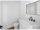 Stylish powder room featuring marble countertops and modern fixtures at 1753 25Th N Ave, St Petersburg, FL 33713