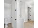 This bathroom features a toilet and a vanity with a quartz countertop and modern hardware at 1753 25Th N Ave, St Petersburg, FL 33713