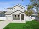 Charming two-story home with a well-manicured front lawn and a light-colored exterior at 1753 25Th N Ave, St Petersburg, FL 33713