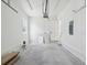 Spacious two car garage with concrete floor, white walls, and a garage door at 1753 25Th N Ave, St Petersburg, FL 33713