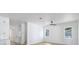 Bright living room with minimalist decor and modern ceiling fan at 1753 25Th N Ave, St Petersburg, FL 33713