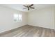Bedroom featuring an updated floor and nice bright window to bring in natural light at 1816 N Pebble Beach Blvd, Sun City Center, FL 33573