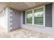 Exterior porch with brick flooring and natural light, perfect for relaxing at 1816 N Pebble Beach Blvd, Sun City Center, FL 33573