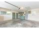 The garage includes built in storage, and access to utilities such as the water heater at 1816 N Pebble Beach Blvd, Sun City Center, FL 33573