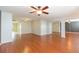 Open living room featuring a ceiling fan, recessed lighting, and laminate flooring at 1816 N Pebble Beach Blvd, Sun City Center, FL 33573