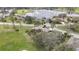 Beautiful home on a golf course near a lake offers serene living with lush greenery and scenic views at 18951 Grand Club Dr, Hudson, FL 34667