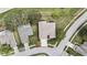 Aerial view of the property with a defined red border and manicured landscaping at 18951 Grand Club Dr, Hudson, FL 34667