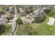 The property is surrounded by lush landscaping, adjacent to the golf course at 18951 Grand Club Dr, Hudson, FL 34667
