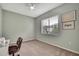 Comfortable bedroom with a window and sewing machine at 18951 Grand Club Dr, Hudson, FL 34667