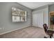Inviting bedroom with a closet and a sewing machine at 18951 Grand Club Dr, Hudson, FL 34667