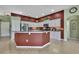 Stylish kitchen featuring granite countertops, stainless steel appliances, and ample cabinet space at 18951 Grand Club Dr, Hudson, FL 34667