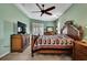 Spacious bedroom featuring a ceiling fan, plantation shutters and soft carpeting at 18951 Grand Club Dr, Hudson, FL 34667