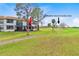 Scenic backyard view overlooking lush green space, perfect for relaxation and enjoying nature at 2073 Skimmer W Ct # 211, Clearwater, FL 33762