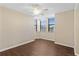 Bedroom featuring hardwood floors, ceiling fan, and plenty of natural light at 2073 Skimmer W Ct # 211, Clearwater, FL 33762