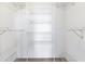 Walk-in closet features wire shelving for maximum storage at 2073 Skimmer W Ct # 211, Clearwater, FL 33762