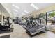Well-equipped community gym with treadmills and fitness machines, providing a convenient workout space at 2073 Skimmer W Ct # 211, Clearwater, FL 33762