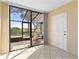 Enjoy outdoor living on the screened lanai, with comfortable seating and scenic golf course views at 2073 Skimmer W Ct # 211, Clearwater, FL 33762