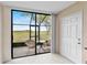 Enjoy outdoor living on the screened lanai, featuring comfortable seating and scenic views at 2073 Skimmer W Ct # 211, Clearwater, FL 33762