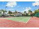 Tennis court available for community residents with seating nearby at 2073 Skimmer W Ct # 211, Clearwater, FL 33762