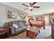 Relaxing bedroom showcases a plush sofa, large artwork, and a view of the bed, creating a harmonious and inviting atmosphere at 20890 Negril Ct # 5, Lutz, FL 33558
