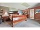 Spacious bedroom features a large bed, dresser, and an en-suite bathroom that creates a private and relaxing retreat at 20890 Negril Ct # 5, Lutz, FL 33558